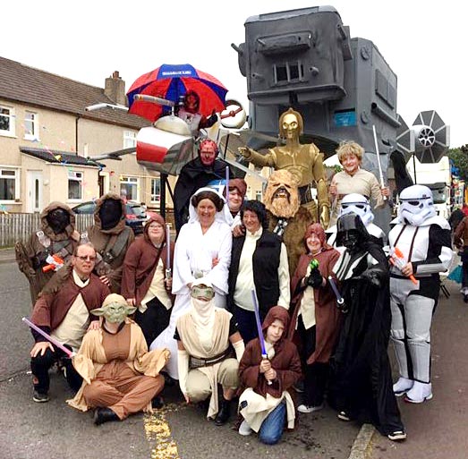 Whitburn Gala day scene showing Flintstones float